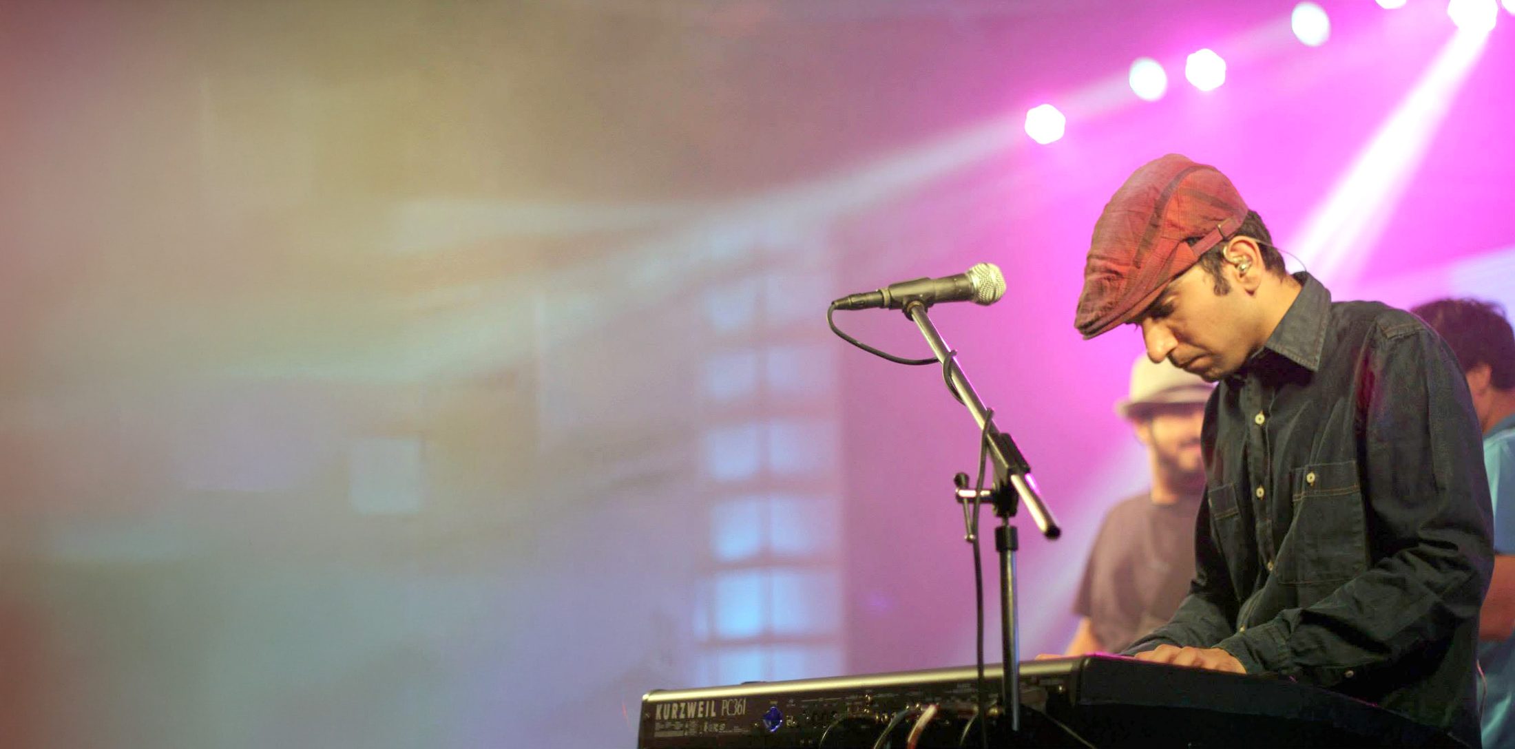 Kartik Dhar performing live on a Kurzweil keyboard